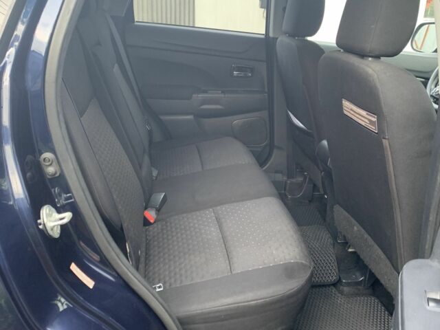 Синий Мицубиси Аутлендер, объемом двигателя 2 л и пробегом 185 тыс. км за 9000 $, фото 1 на Automoto.ua