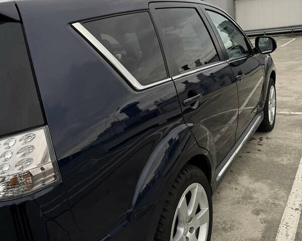 Синий Мицубиси Аутлендер, объемом двигателя 2.2 л и пробегом 213 тыс. км за 12000 $, фото 22 на Automoto.ua