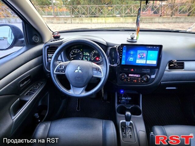 Синий Мицубиси Аутлендер, объемом двигателя 2 л и пробегом 314 тыс. км за 10999 $, фото 8 на Automoto.ua