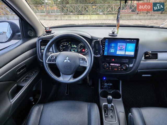 Мицубиси Аутлендер 2012 в Харькове на Automoto.ua Синий Мицубиси Аутлендер, объемом двигателя 2 л и пробегом 314 тыс. км за 11800 $, фото 9 на Automoto.ua