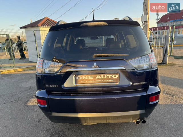 Синий Мицубиси Аутлендер, объемом двигателя 2.2 л и пробегом 192 тыс. км за 13490 $, фото 7 на Automoto.ua