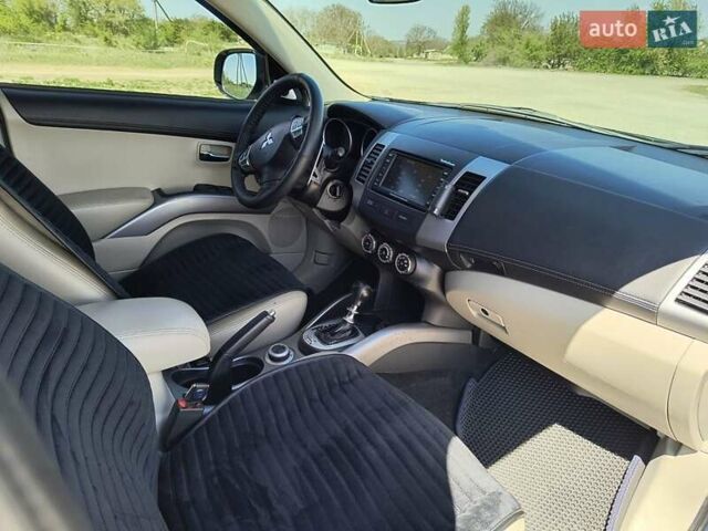 Синій Міцубісі Аутлендер, об'ємом двигуна 2.2 л та пробігом 270 тис. км за 12300 $, фото 9 на Automoto.ua