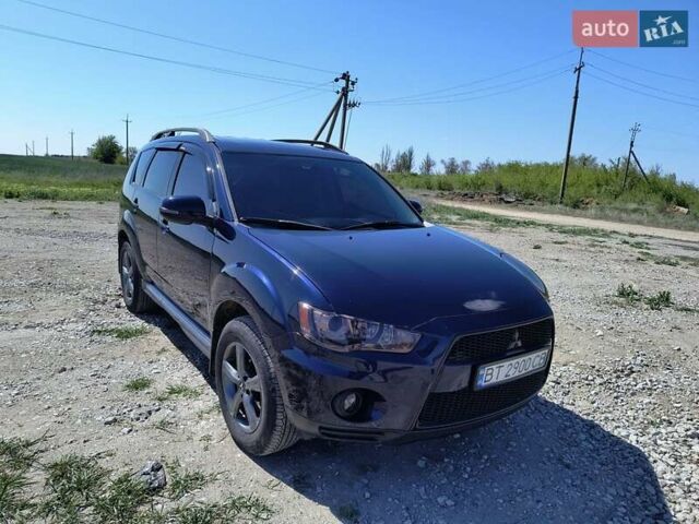 Синій Міцубісі Аутлендер, об'ємом двигуна 2.2 л та пробігом 270 тис. км за 12300 $, фото 1 на Automoto.ua