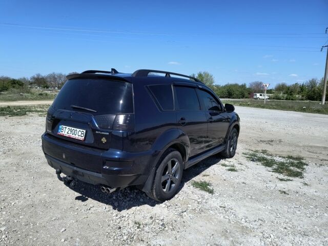 Синій Міцубісі Аутлендер, об'ємом двигуна 2.2 л та пробігом 270 тис. км за 12300 $, фото 3 на Automoto.ua