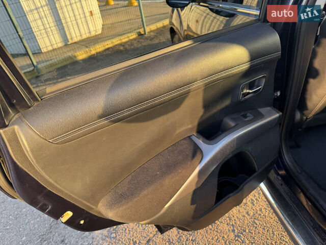 Синий Мицубиси Аутлендер, объемом двигателя 2.2 л и пробегом 192 тыс. км за 12990 $, фото 22 на Automoto.ua