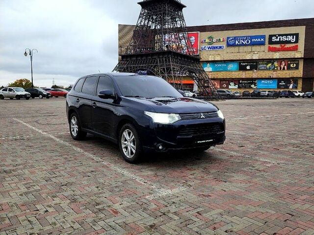 Синий Мицубиси Аутлендер, объемом двигателя 2 л и пробегом 314 тыс. км за 10999 $, фото 1 на Automoto.ua