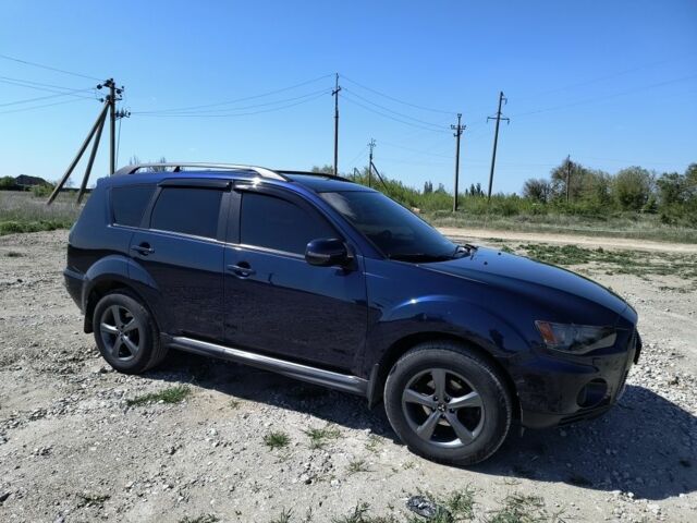Синій Міцубісі Аутлендер, об'ємом двигуна 2.2 л та пробігом 270 тис. км за 12300 $, фото 1 на Automoto.ua