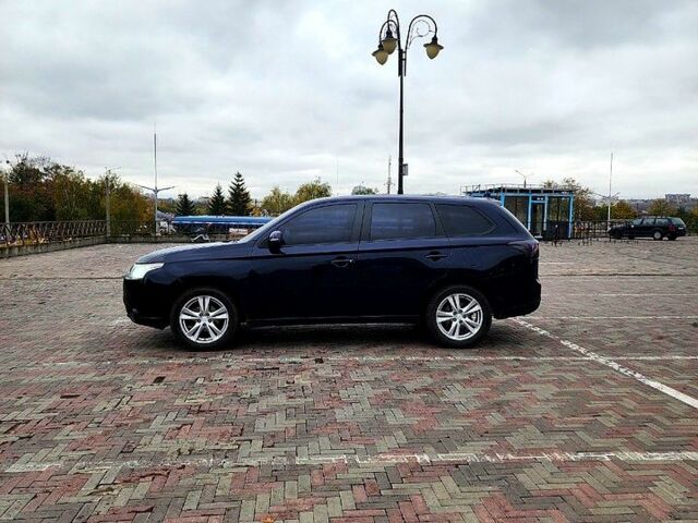Синий Мицубиси Аутлендер, объемом двигателя 2 л и пробегом 314 тыс. км за 10999 $, фото 3 на Automoto.ua