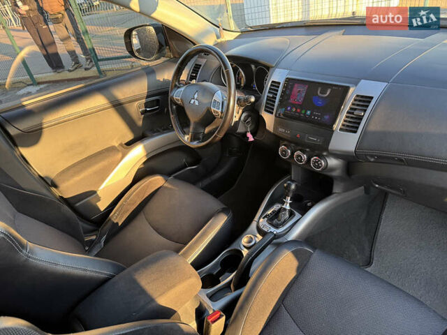 Синий Мицубиси Аутлендер, объемом двигателя 2.2 л и пробегом 192 тыс. км за 13490 $, фото 28 на Automoto.ua