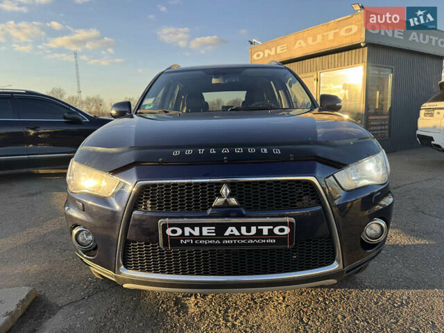 Синий Мицубиси Аутлендер, объемом двигателя 2.2 л и пробегом 192 тыс. км за 13490 $, фото 3 на Automoto.ua