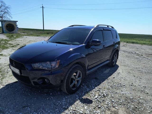 Синій Міцубісі Аутлендер, об'ємом двигуна 2.2 л та пробігом 270 тис. км за 12300 $, фото 2 на Automoto.ua