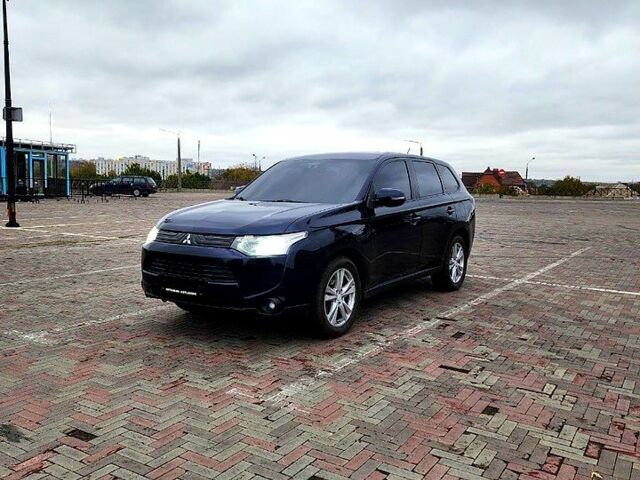 Синий Мицубиси Аутлендер, объемом двигателя 2 л и пробегом 314 тыс. км за 10999 $, фото 2 на Automoto.ua