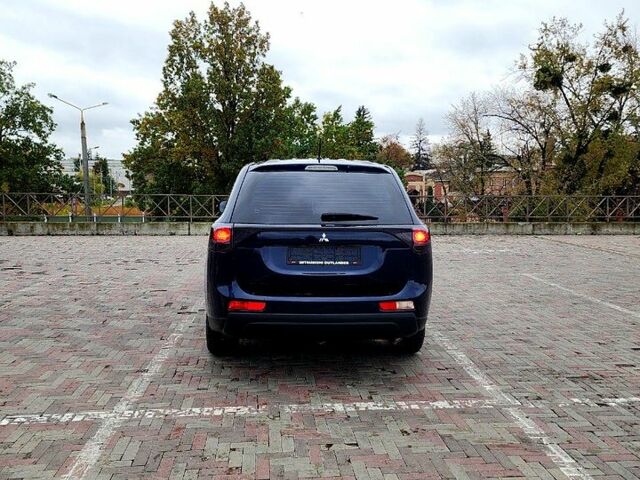 Синий Мицубиси Аутлендер, объемом двигателя 2 л и пробегом 314 тыс. км за 10999 $, фото 5 на Automoto.ua
