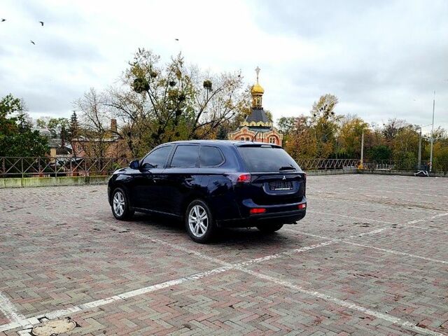 Синий Мицубиси Аутлендер, объемом двигателя 2 л и пробегом 314 тыс. км за 10999 $, фото 4 на Automoto.ua