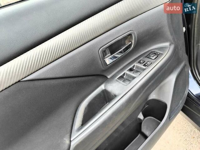 Синій Міцубісі Аутлендер, об'ємом двигуна 2.4 л та пробігом 213 тис. км за 10990 $, фото 34 на Automoto.ua