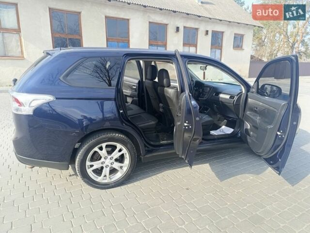 Синий Мицубиси Аутлендер, объемом двигателя 2.36 л и пробегом 173 тыс. км за 9990 $, фото 17 на Automoto.ua