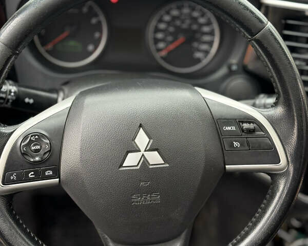 Синій Міцубісі Аутлендер, об'ємом двигуна 2.4 л та пробігом 212 тис. км за 10000 $, фото 13 на Automoto.ua