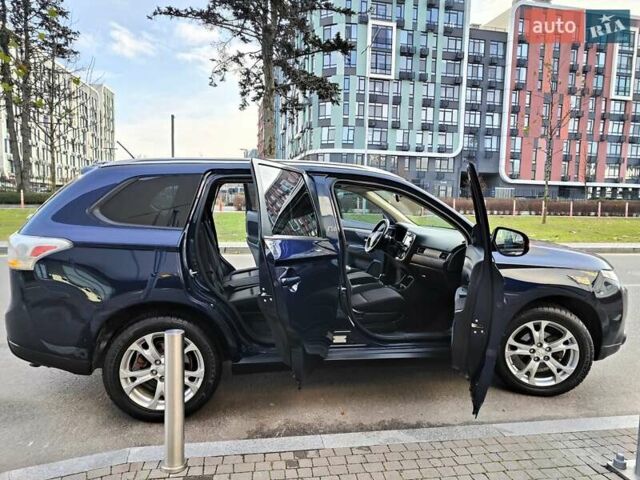 Синій Міцубісі Аутлендер, об'ємом двигуна 2.4 л та пробігом 213 тис. км за 10990 $, фото 26 на Automoto.ua