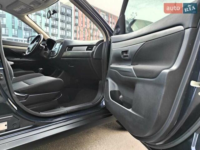 Синій Міцубісі Аутлендер, об'ємом двигуна 2.4 л та пробігом 213 тис. км за 10990 $, фото 46 на Automoto.ua