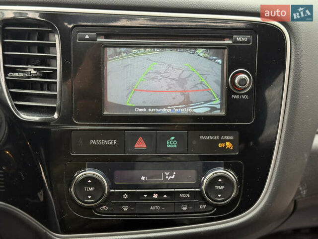 Синій Міцубісі Аутлендер, об'ємом двигуна 2.4 л та пробігом 212 тис. км за 10000 $, фото 11 на Automoto.ua