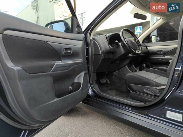 Синій Міцубісі Аутлендер, об'ємом двигуна 2.4 л та пробігом 213 тис. км за 10990 $, фото 33 на Automoto.ua