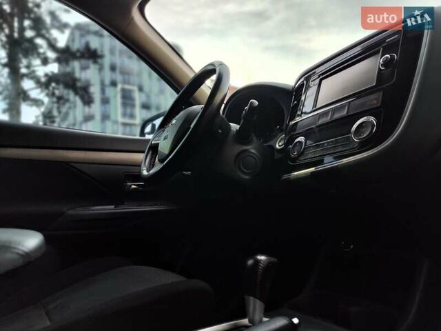 Синій Міцубісі Аутлендер, об'ємом двигуна 2.4 л та пробігом 213 тис. км за 10990 $, фото 49 на Automoto.ua