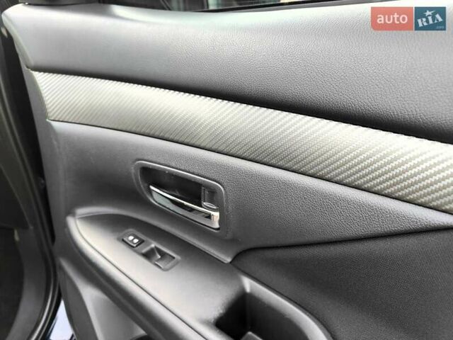 Синій Міцубісі Аутлендер, об'ємом двигуна 2.4 л та пробігом 213 тис. км за 10990 $, фото 47 на Automoto.ua