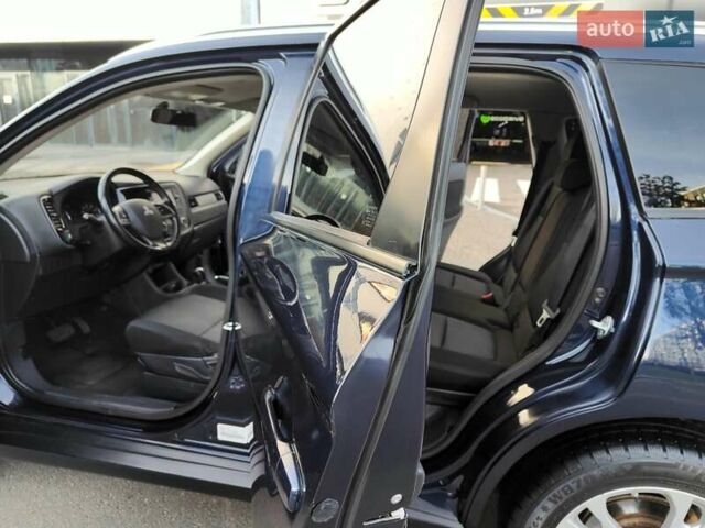 Синій Міцубісі Аутлендер, об'ємом двигуна 2.4 л та пробігом 213 тис. км за 10990 $, фото 5 на Automoto.ua
