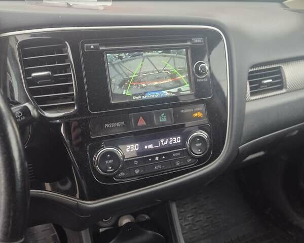 Синій Міцубісі Аутлендер, об'ємом двигуна 2.36 л та пробігом 178 тис. км за 10500 $, фото 12 на Automoto.ua