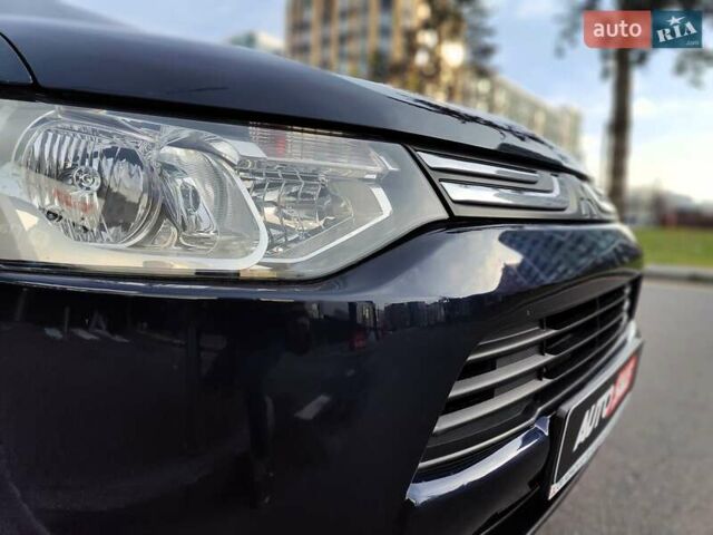 Синій Міцубісі Аутлендер, об'ємом двигуна 2.4 л та пробігом 213 тис. км за 10990 $, фото 32 на Automoto.ua