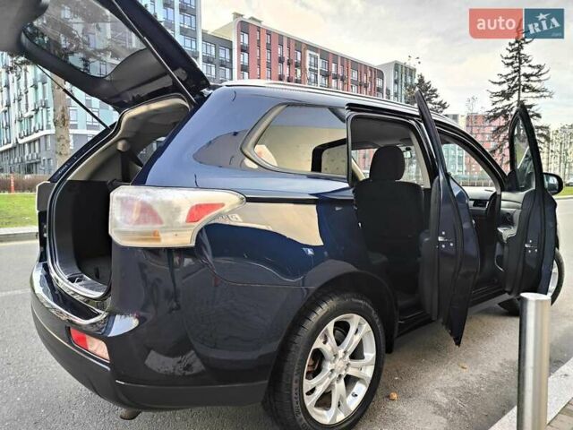 Синій Міцубісі Аутлендер, об'ємом двигуна 2.4 л та пробігом 213 тис. км за 10990 $, фото 21 на Automoto.ua