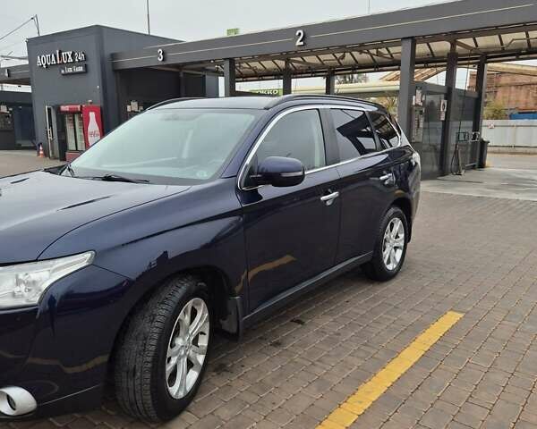 Синій Міцубісі Аутлендер, об'ємом двигуна 2.36 л та пробігом 183 тис. км за 14000 $, фото 3 на Automoto.ua