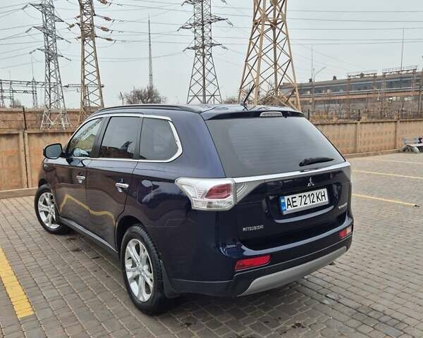 Синій Міцубісі Аутлендер, об'ємом двигуна 2.36 л та пробігом 183 тис. км за 14000 $, фото 1 на Automoto.ua