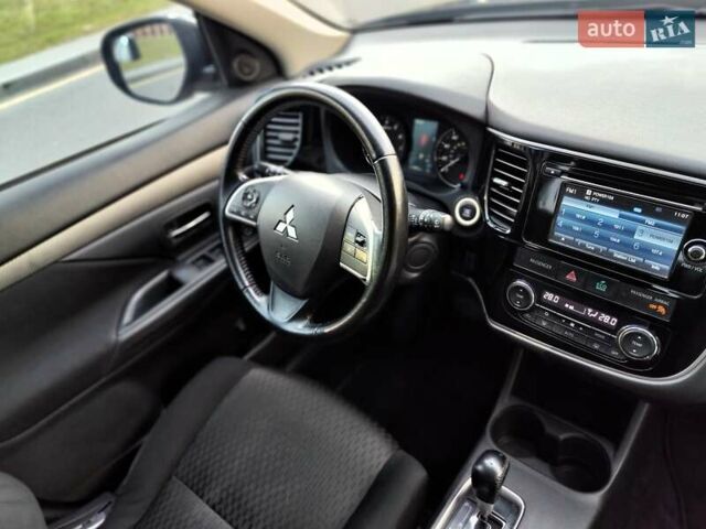 Синій Міцубісі Аутлендер, об'ємом двигуна 2.4 л та пробігом 213 тис. км за 10990 $, фото 50 на Automoto.ua