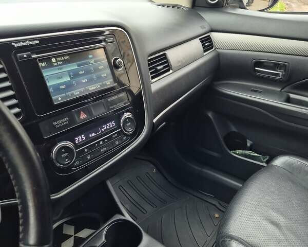 Синій Міцубісі Аутлендер, об'ємом двигуна 2.36 л та пробігом 183 тис. км за 14000 $, фото 16 на Automoto.ua