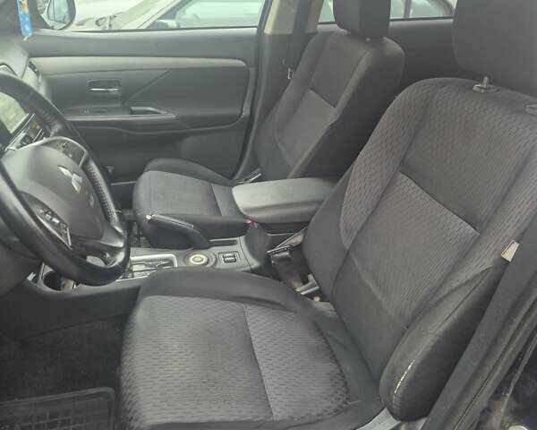 Синій Міцубісі Аутлендер, об'ємом двигуна 2.36 л та пробігом 178 тис. км за 10500 $, фото 11 на Automoto.ua