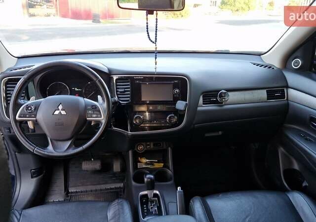 Синій Міцубісі Аутлендер, об'ємом двигуна 3 л та пробігом 214 тис. км за 10500 $, фото 2 на Automoto.ua