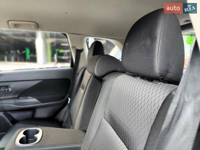 Синій Міцубісі Аутлендер, об'ємом двигуна 2.4 л та пробігом 213 тис. км за 10990 $, фото 45 на Automoto.ua