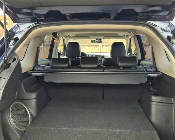 Синій Міцубісі Аутлендер, об'ємом двигуна 2.36 л та пробігом 183 тис. км за 14000 $, фото 10 на Automoto.ua