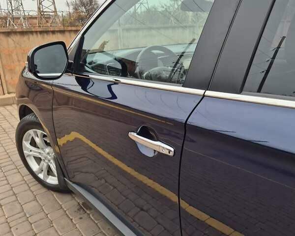 Синій Міцубісі Аутлендер, об'ємом двигуна 2.36 л та пробігом 183 тис. км за 14000 $, фото 6 на Automoto.ua