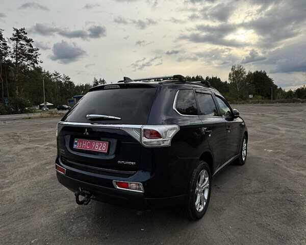 Синій Міцубісі Аутлендер, об'ємом двигуна 2.3 л та пробігом 230 тис. км за 11950 $, фото 12 на Automoto.ua
