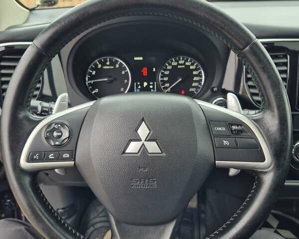 Синій Міцубісі Аутлендер, об'ємом двигуна 2.36 л та пробігом 183 тис. км за 14000 $, фото 14 на Automoto.ua