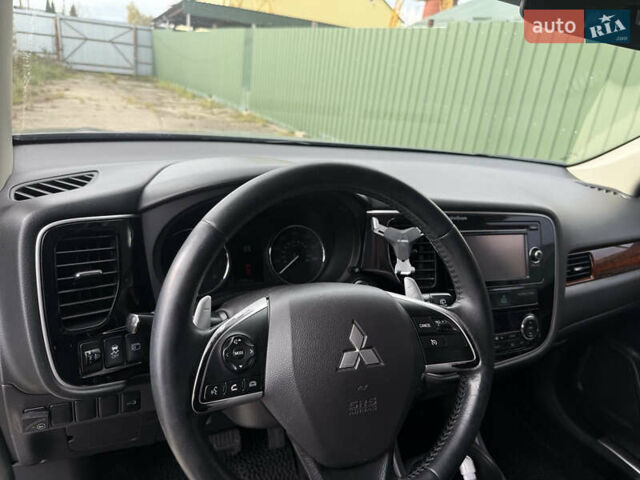 Синий Мицубиси Аутлендер, объемом двигателя 3 л и пробегом 180 тыс. км за 13000 $, фото 10 на Automoto.ua