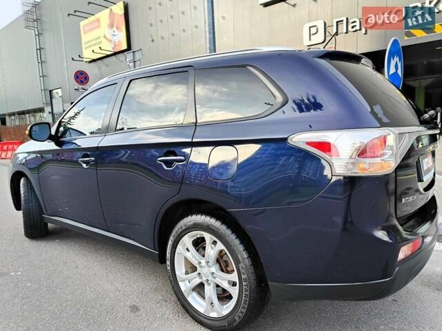 Синій Міцубісі Аутлендер, об'ємом двигуна 2.4 л та пробігом 213 тис. км за 10990 $, фото 12 на Automoto.ua