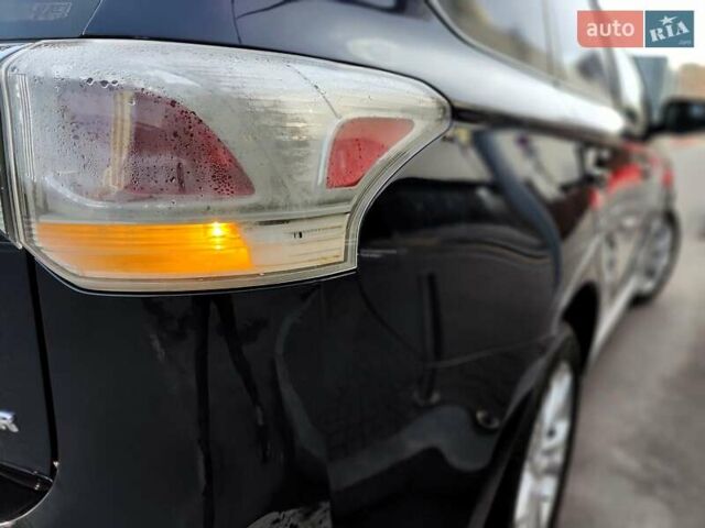 Синій Міцубісі Аутлендер, об'ємом двигуна 2.4 л та пробігом 213 тис. км за 10990 $, фото 19 на Automoto.ua