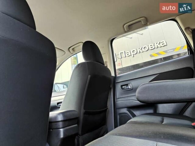 Синій Міцубісі Аутлендер, об'ємом двигуна 2.4 л та пробігом 213 тис. км за 10990 $, фото 44 на Automoto.ua