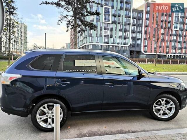 Синій Міцубісі Аутлендер, об'ємом двигуна 2.4 л та пробігом 213 тис. км за 10990 $, фото 24 на Automoto.ua