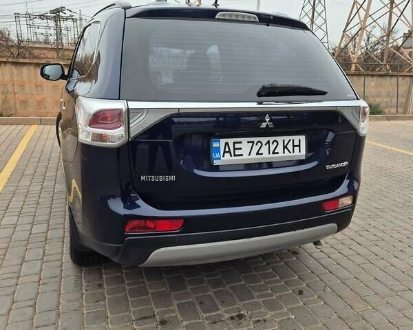 Синій Міцубісі Аутлендер, об'ємом двигуна 2.36 л та пробігом 183 тис. км за 14000 $, фото 4 на Automoto.ua