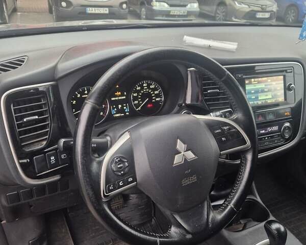 Синій Міцубісі Аутлендер, об'ємом двигуна 2.36 л та пробігом 178 тис. км за 10500 $, фото 10 на Automoto.ua