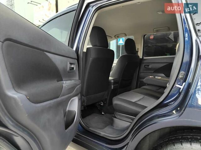 Синій Міцубісі Аутлендер, об'ємом двигуна 2.4 л та пробігом 213 тис. км за 10990 $, фото 40 на Automoto.ua
